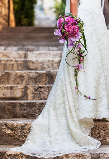 Purple Bridal Bouquet and Gorgeous Wedding Dress