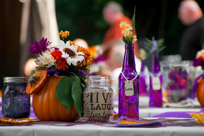 Autumn wedding table decorations with pumpkin centerpieces